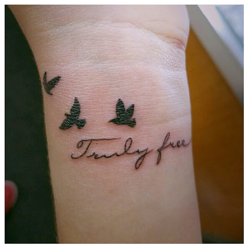 Explore female forearm tattoo ideas, creative tattoo ideas in Buffalo, available at Wishful Inking Tattoos & Piercings