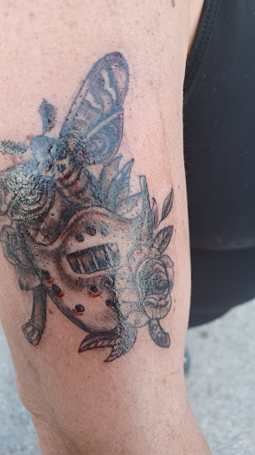 Explore roman numeral tattoo ideas for guys, creative tattoo ideas in Muncie, available at Obscura Tattoo shop and Oddity Collective