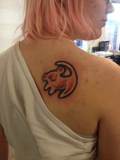 Explore street signs tattoo ideas, creative tattoo ideas in Nampa, available at Temptation Tattoo & Body Piercing