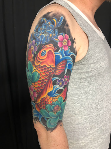 Explore samurai tattoo sleeve ideas, creative tattoo ideas in Greenfield, available at Tattoos In Time Studio