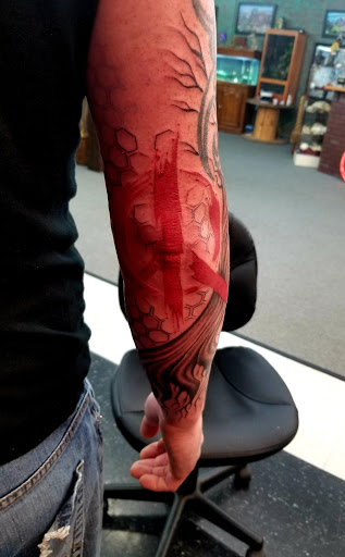Explore pet sematary tattoo ideas, creative tattoo ideas in Forest Lake, available at Electric Blue Tattoo Co.