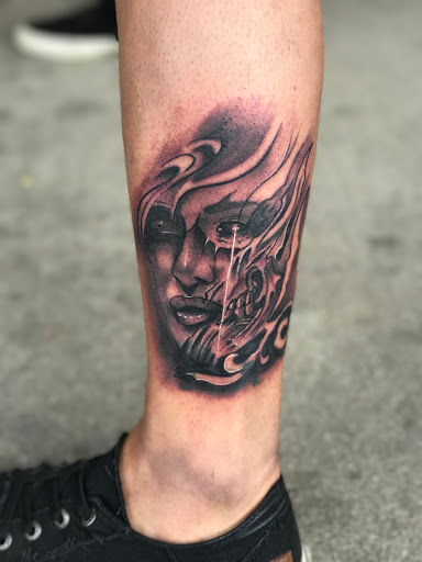 Explore tattoo ideas for black males, creative tattoo ideas in Roscoe, available at Elevated Ink Tattoo