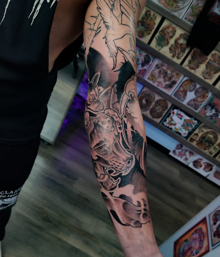 Explore tattoo ideas for leg sleeve, creative tattoo ideas in Hampton, available at Ancient Art Tattoo Studio