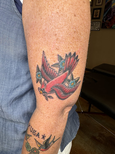 Explore goldendoodle tattoo ideas, creative tattoo ideas in San Diego, available at San Diego Tattoo Company