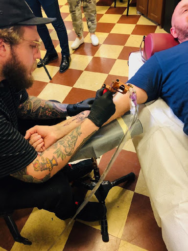 Explore arm mens tattoo ideas, creative tattoo ideas in Erie, available at Wayward Tattoo Studio