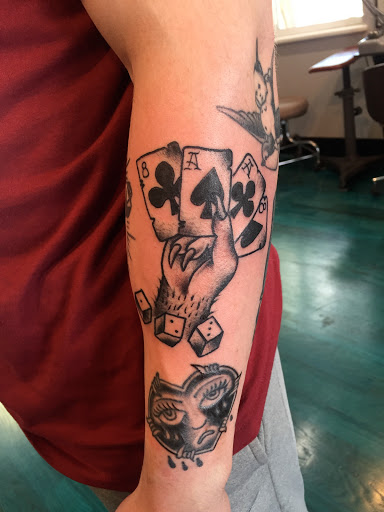 Explore mens color sleeve tattoo ideas, creative tattoo ideas in Reno, available at Aces Tattoo