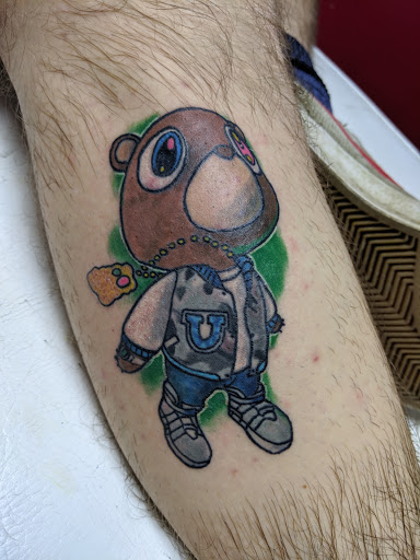 Explore bee tattoo ideas for guys, creative tattoo ideas in Akron, available at Knuckle Up Ink Tattoos