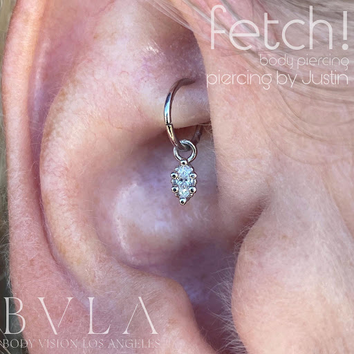 Find tummy tuck tattoo ideas for your next unique tattoo in Redding at Fetch Body Piercing