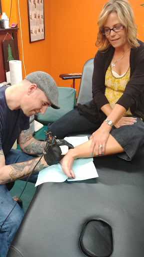 Explore forearm tattoo cover up ideas, creative tattoo ideas in Glenwood Springs, available at Spyder Rose Tattoo