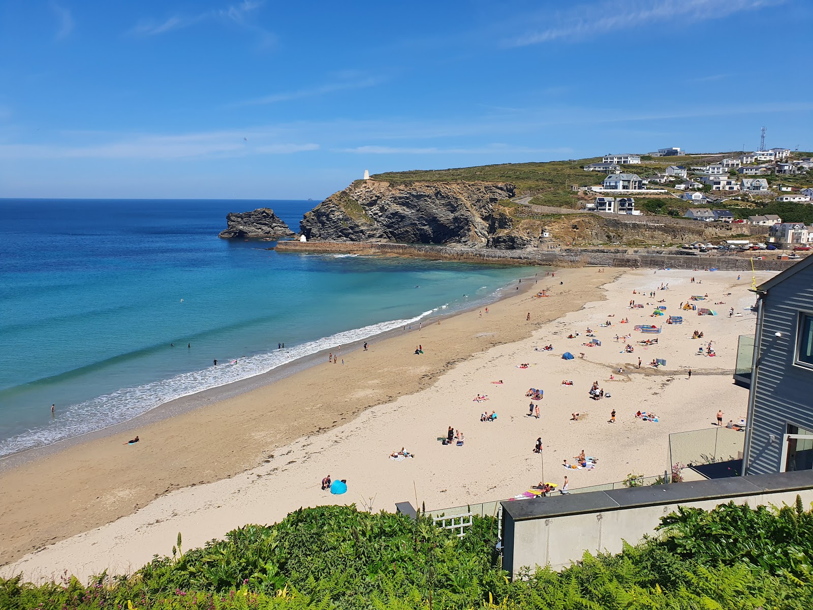 Photo of Portreath Beach with bright sand surface