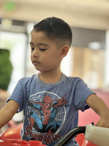 Explore open book tattoo ideas, creative tattoo ideas in Chino, available at Kids Fun Cuts - Childrens Haircuts & Ear Piercings