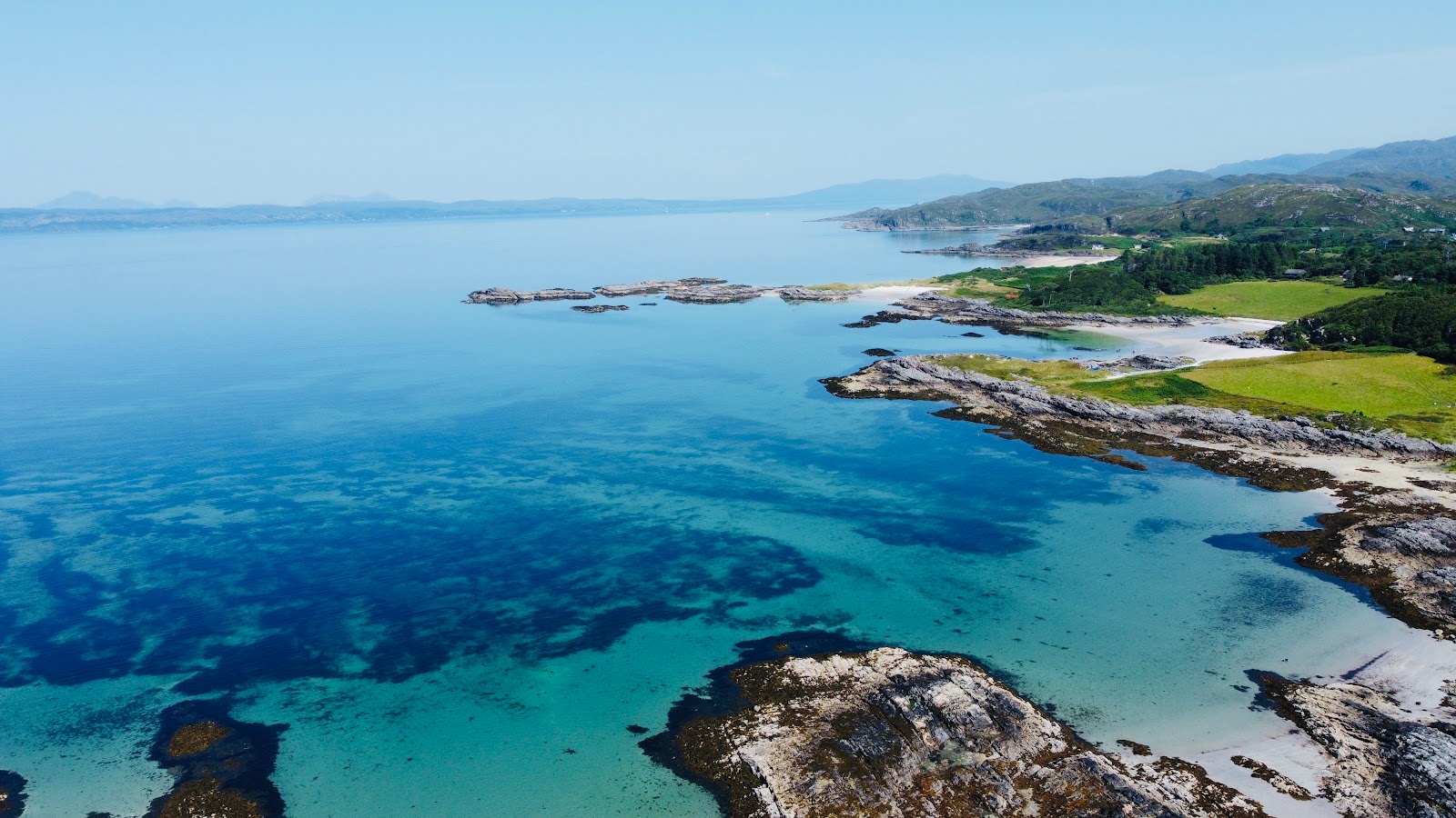 Photo of Arisaig Beach with turquoise pure water surface