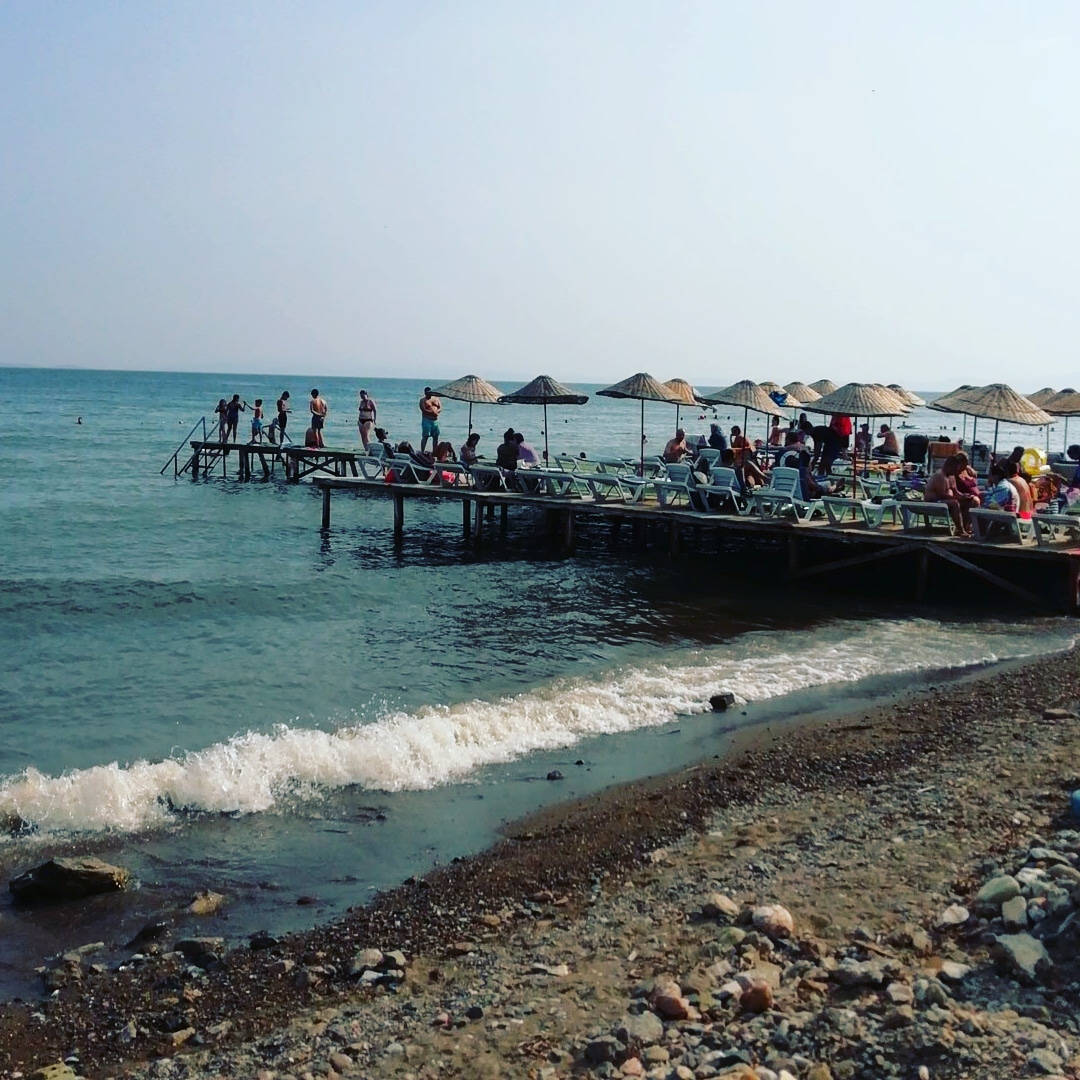 Foto von Durmaz Camping beach mit türkisfarbenes wasser Oberfläche