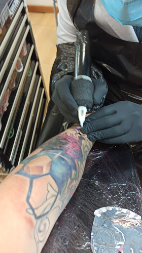 Tattoo Shop «New Life Tattoos», reviews and photos, 404 E Green St, Champaign, IL 61820, USA