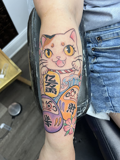Explore half arm sleeve tattoo ideas, creative tattoo ideas in Virginia Beach, available at The Collective Tattoo & Body Piercing