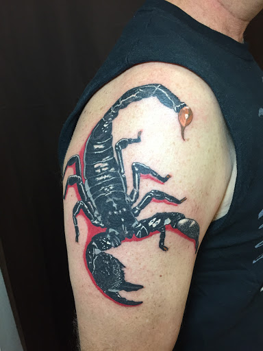 Explore angel memorial tattoo ideas, creative tattoo ideas in Magnolia, available at Tanner Tattoos