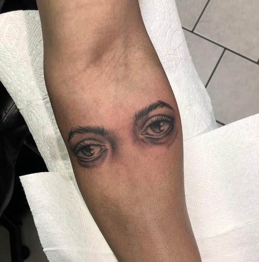 Explore ideas for ring tattoos, creative tattoo ideas in Edison, available at Tattoo Asylum