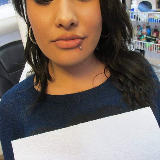 Explore tattoo ideas for first born daughter, creative tattoo ideas in Elko, available at Tom Custom Tattoos and Body Piercing Studio