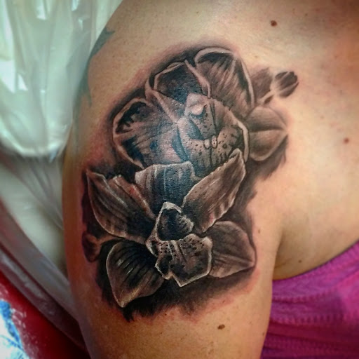 Explore cerebral palsy tattoo ideas, creative tattoo ideas in El Paso, available at House of Pain Tattoo & Body Piercing Studios