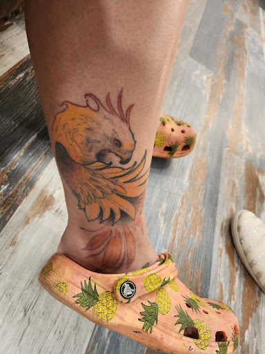 Explore ladies arm tattoo ideas, creative tattoo ideas in Jeannette, available at Damaged Legacy Studios