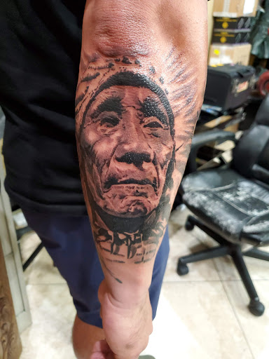 Explore rose tattoo ideas for women, creative tattoo ideas in Fountain Valley, available at Lowrider Tattoo Studios