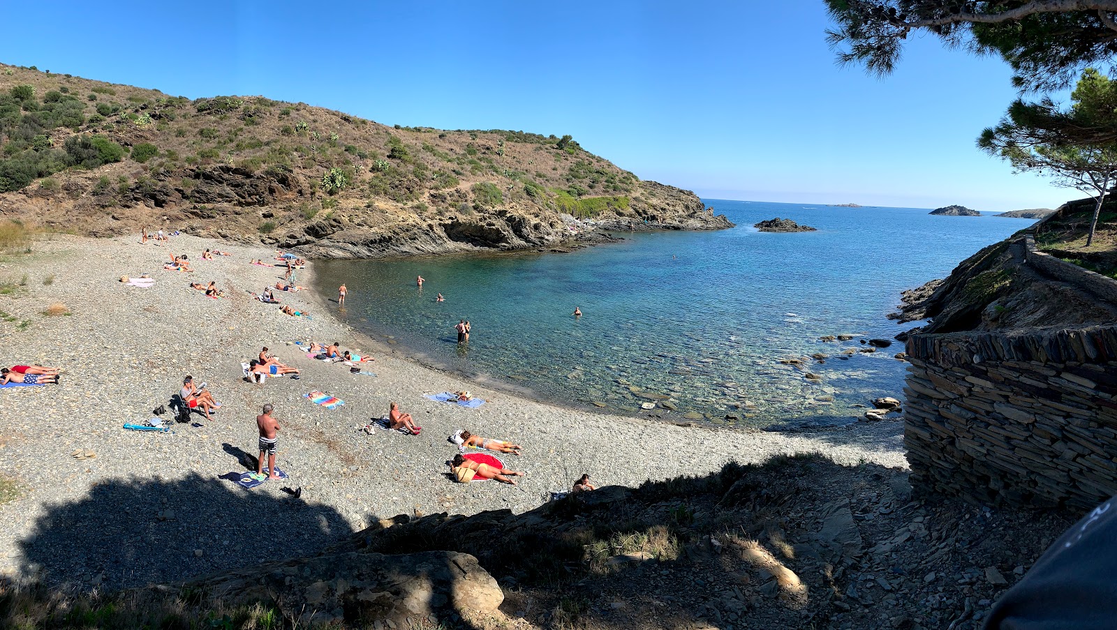 Fotografie cu S'Alqueria gran Beach cu o suprafață de apă pură albastră