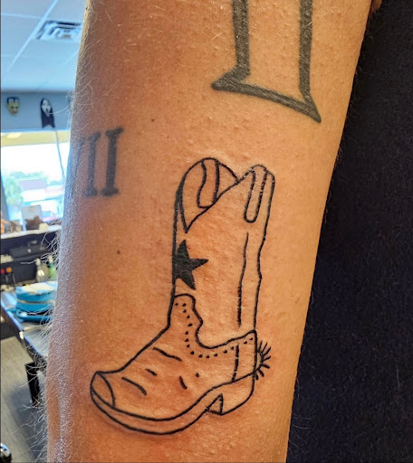 Find skull tattoo idea for your next unique tattoo in Palm Harbor at Angry Owl Tattoo and Piercing