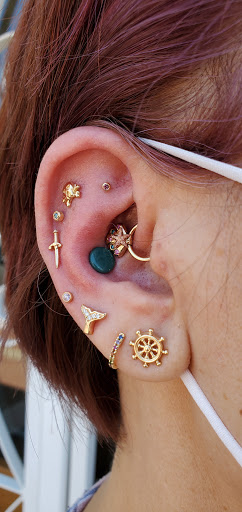 Explore dog outline tattoo ideas, creative tattoo ideas in Phoenix, available at Wholehearted Body Piercing