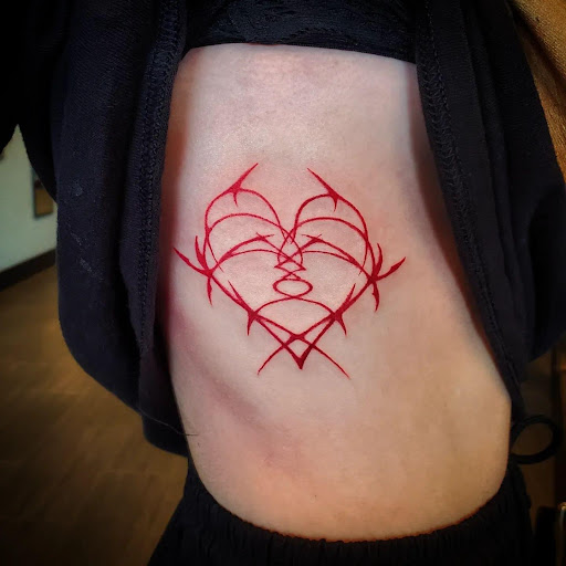 Explore girly half sleeve tattoo ideas for females, creative tattoo ideas in Palm Harbor, available at Angry Owl Tattoo and Piercing