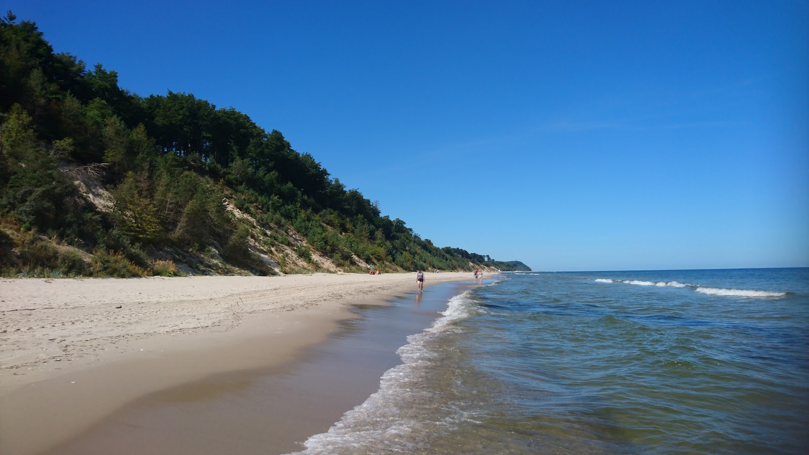 Strand Kolpinsee'in fotoğrafı parlak kum yüzey ile