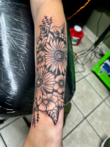 Explore blue rose tattoo ideas, creative tattoo ideas in Gadsden, available at Zekez Inkz Tattoos & Piercings