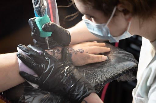 Explore sadness tattoo ideas, creative tattoo ideas in Canton, available at The Inkeepers Tattoo Parlor