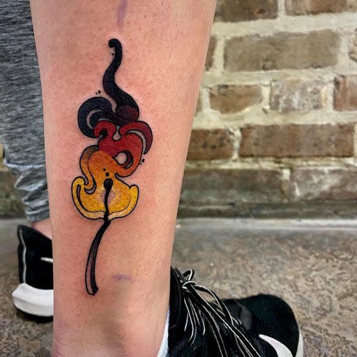 Explore tattoo ideas for side, creative tattoo ideas in New Orleans, available at TOUGH LOVE TATTOOS