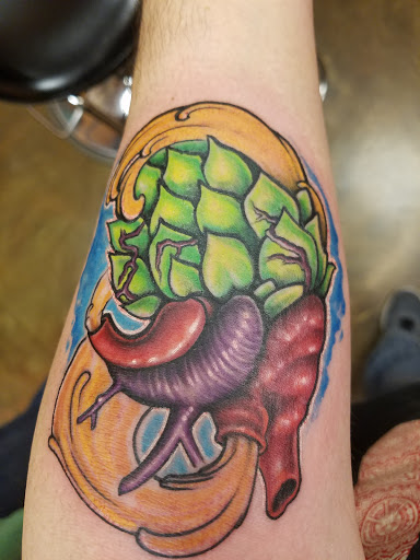 Explore armor of god tattoo ideas, creative tattoo ideas in Lockport, available at Tattoo City by Larry Brogan