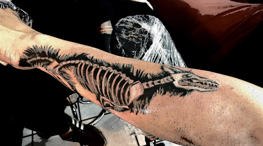 Explore tattoo ideas for female sleeve, creative tattoo ideas in Eunice, available at Supreme Ink Tattoo & Piercing