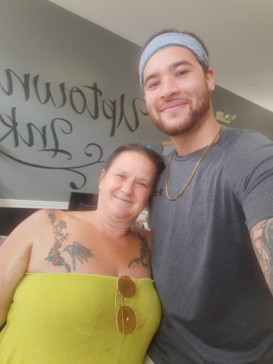 Explore cross stitch tattoo ideas, creative tattoo ideas in Mexico, available at Uptown Ink Tattoo Parlor