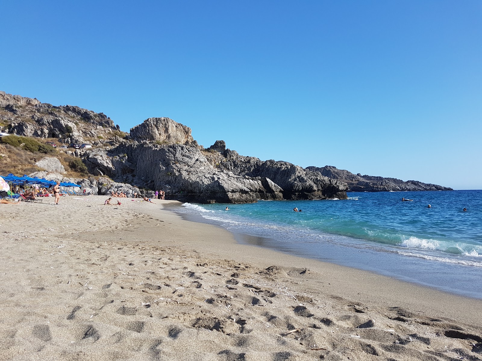 Foto von Ammoudaki beach mit kleine bucht