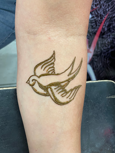 Explore tattoo ideas for spine, creative tattoo ideas in South Padre Island, available at Peggys Temporary & Permanent Tattoos