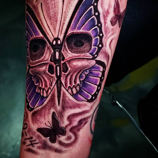 Explore cherub tattoo ideas, creative tattoo ideas in Colton, available at Vengeance Ink Tattoo & body piercing