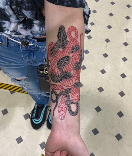 Explore birth flowers tattoo ideas, creative tattoo ideas in Evansville, available at Ink Therapy 101