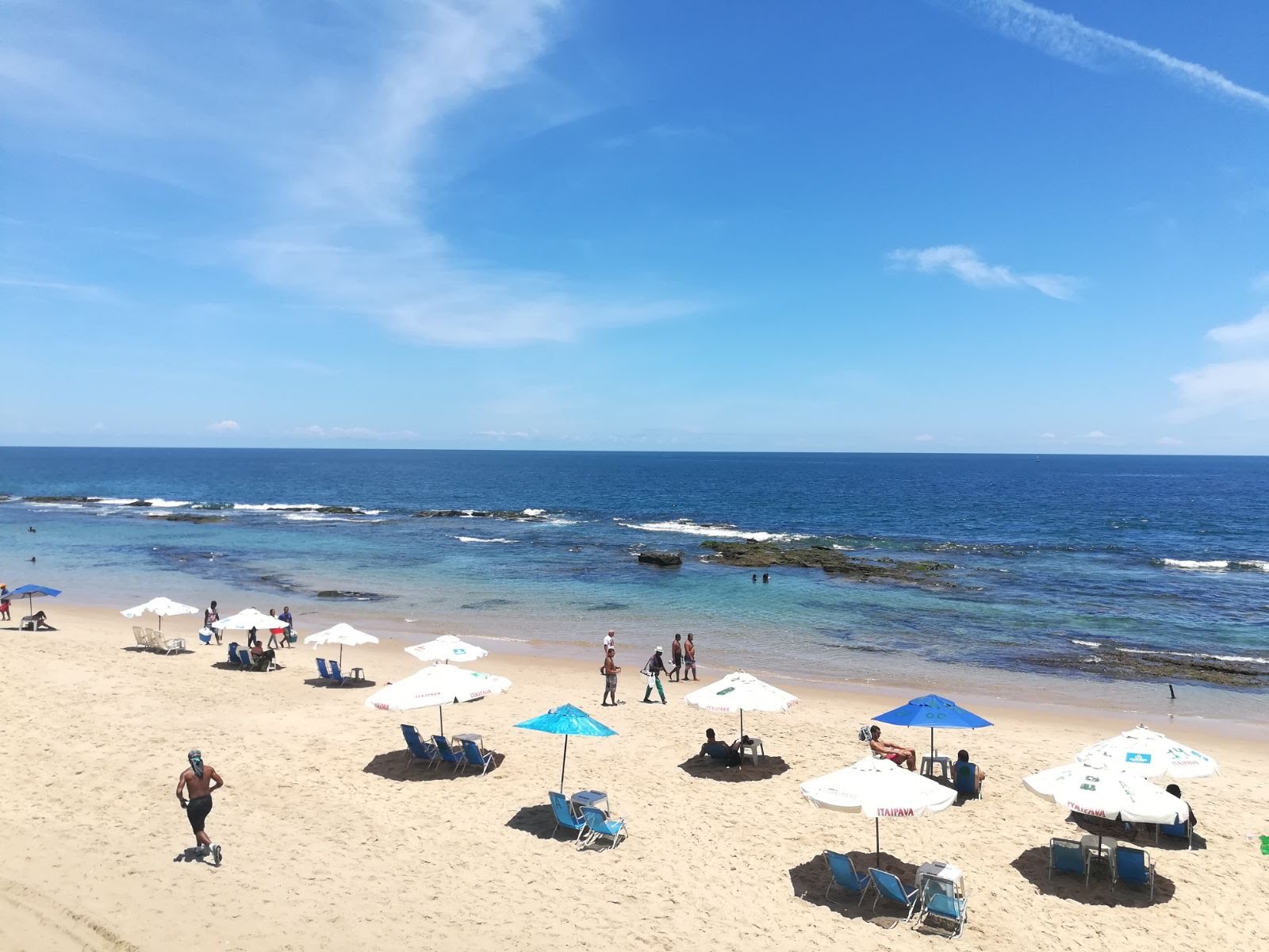 Photo de Porto da Barra Beach avec baie spacieuse