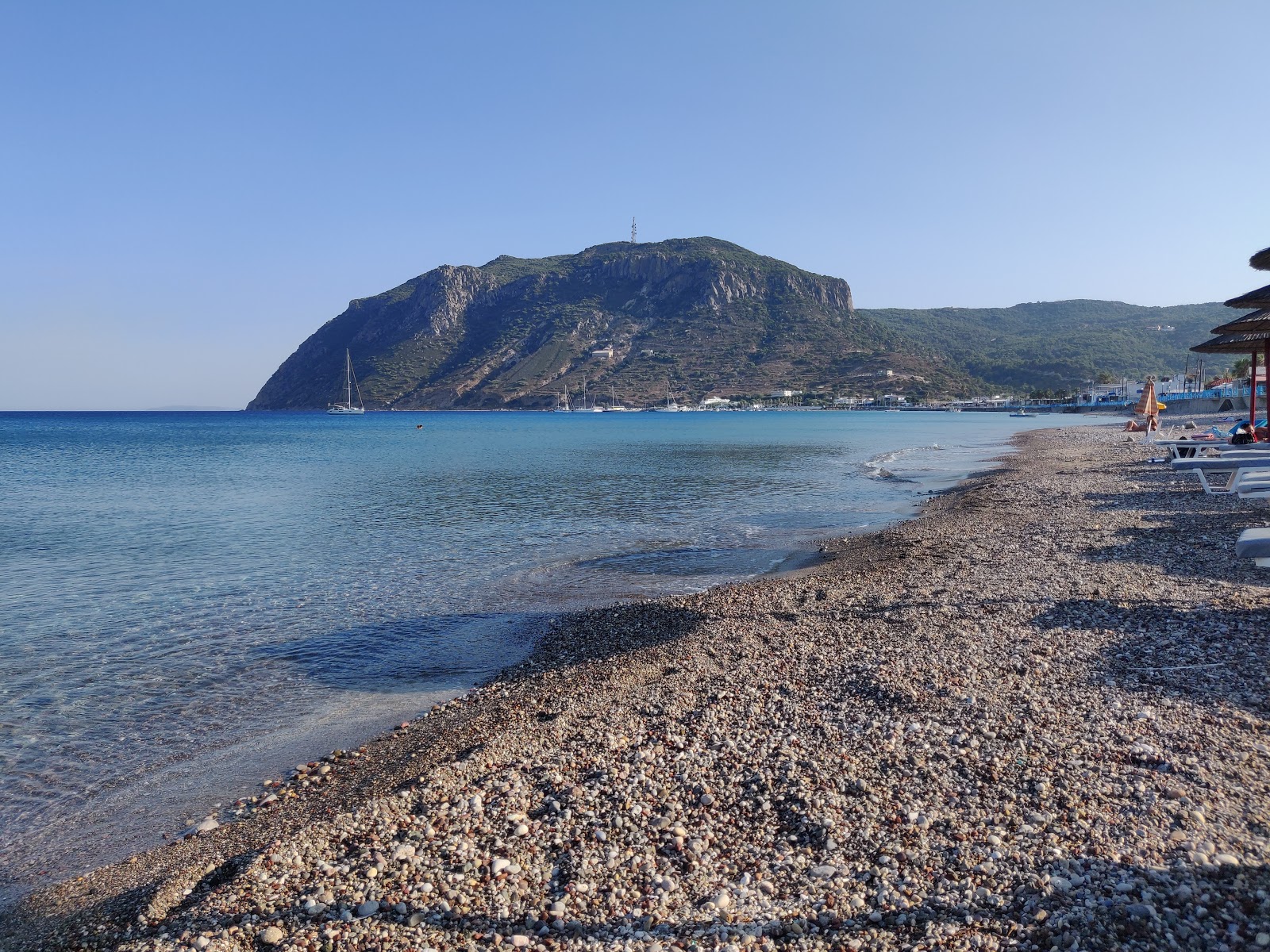 Photo of Paralia Kefalos with turquoise pure water surface