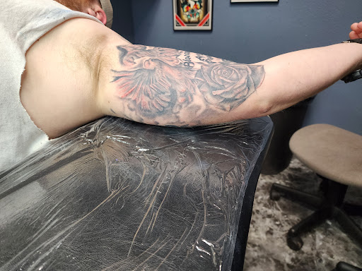 Explore lip tattoo ideas for men, creative tattoo ideas in Yankton, available at Exquisite Ink