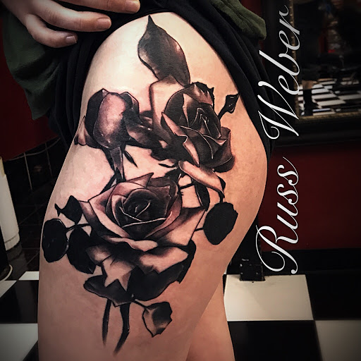Explore dark hand tattoo ideas, creative tattoo ideas in Tucson, available at Sacred Art Tattoo Studio