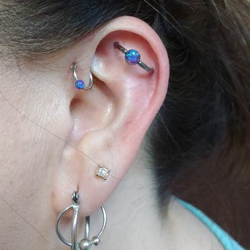 Explore birth month flower tattoo ideas, creative tattoo ideas in Vancouver, available at Chaotic Good Body Piercing & Tattoo