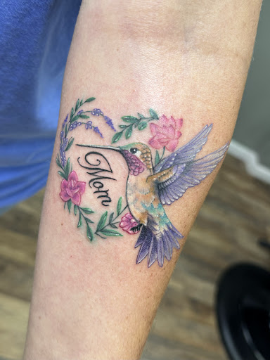 Explore first born son tattoo ideas, creative tattoo ideas in Vincennes, available at Silver Owl Tattoo