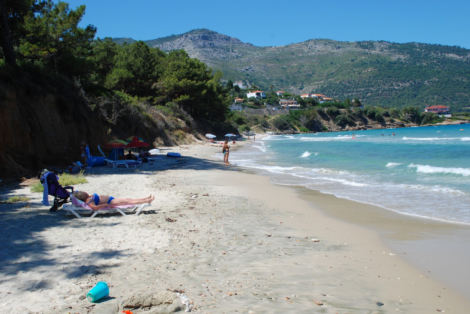 Foto av Dolphins beach med lång rak strand