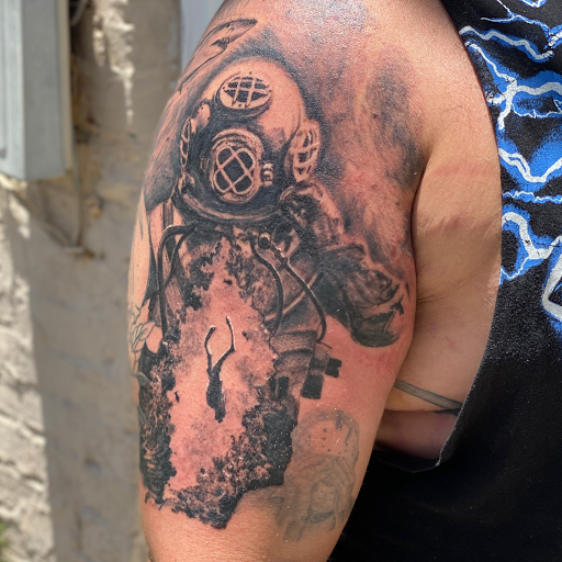 Explore growth tattoo ideas for guys, creative tattoo ideas in Brunswick, available at Brunswick Tattoo Company