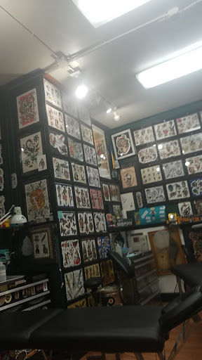 Tattoo Shop «Consolidated Tattoo», reviews and photos, 107 W Kearsley St, Flint, MI 48502, USA