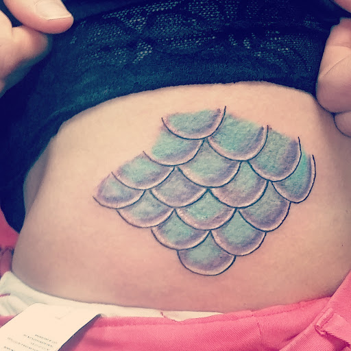 Explore alcoholic tattoo ideas, creative tattoo ideas in Frisco, available at Frisco Tattoo Company - Steel PaintBrush